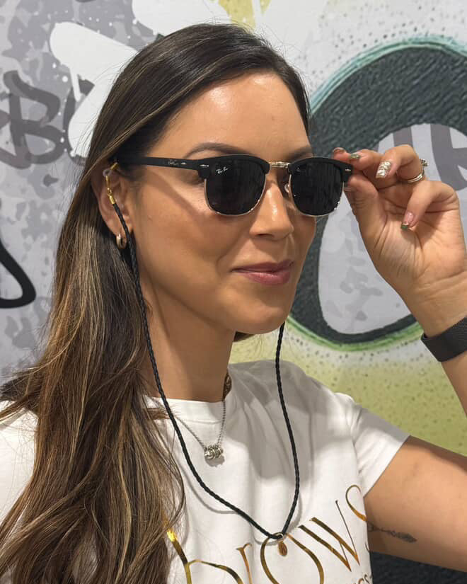 Keebos sunglass strap worn around the neck