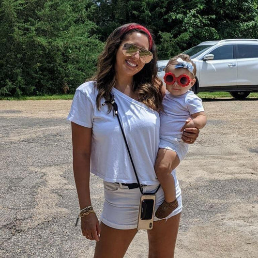 What do moms use to carry their phone while holding a baby? Hands-free options that actually help