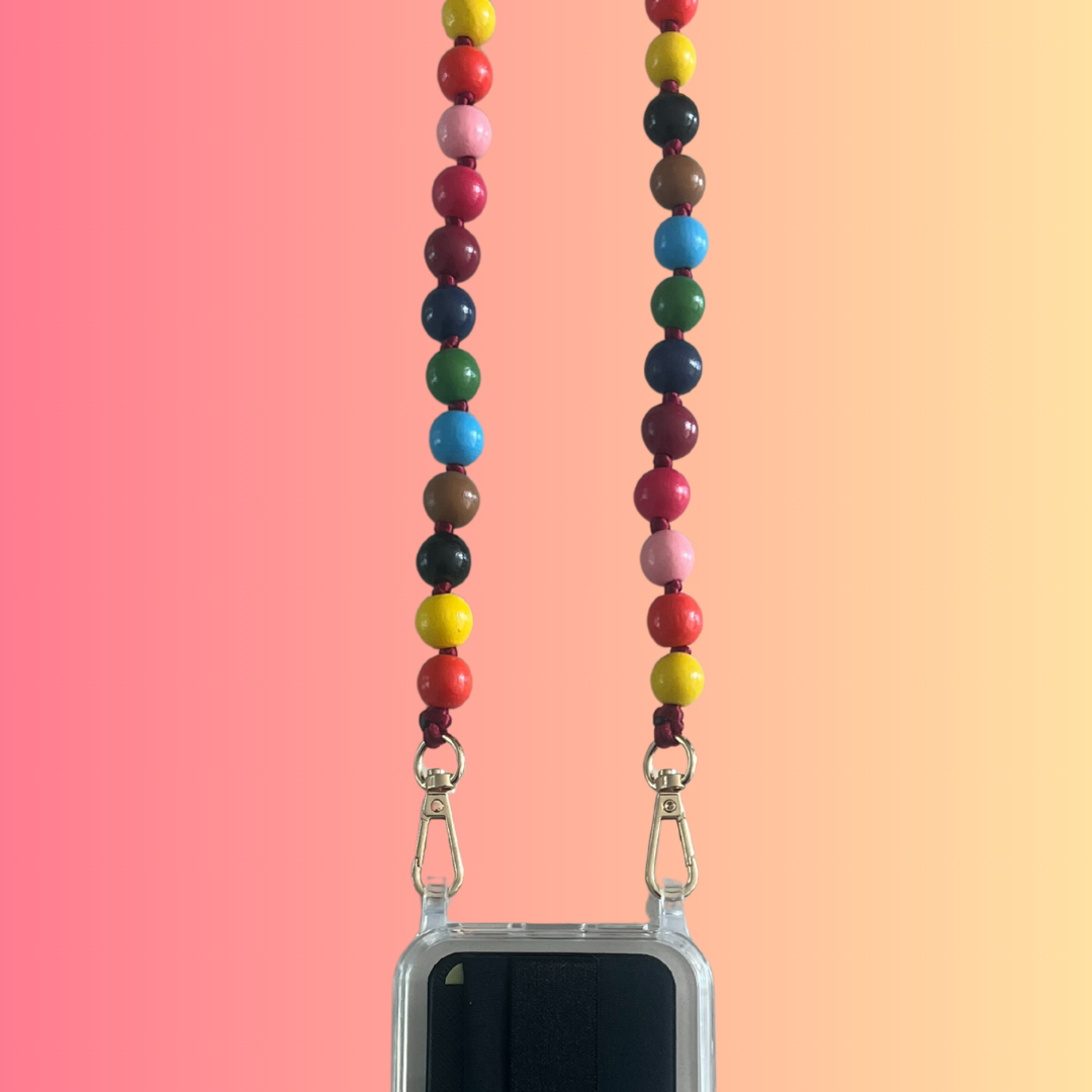 Colorful beaded phone lanyard with a clear phone case on a gradient background