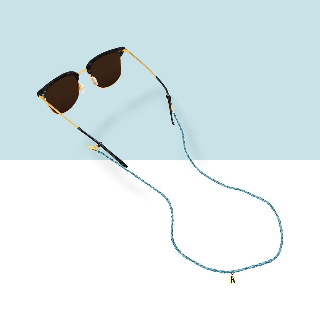 Light blue sunglass strap: sky blue woven vegan leather cord on sunglasses