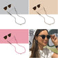 Keebos sunglass strap bundle: all three colors, black, brown and pink, plus the strap worn with sunglasses