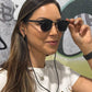 Keebos sunglass strap worn around the neck