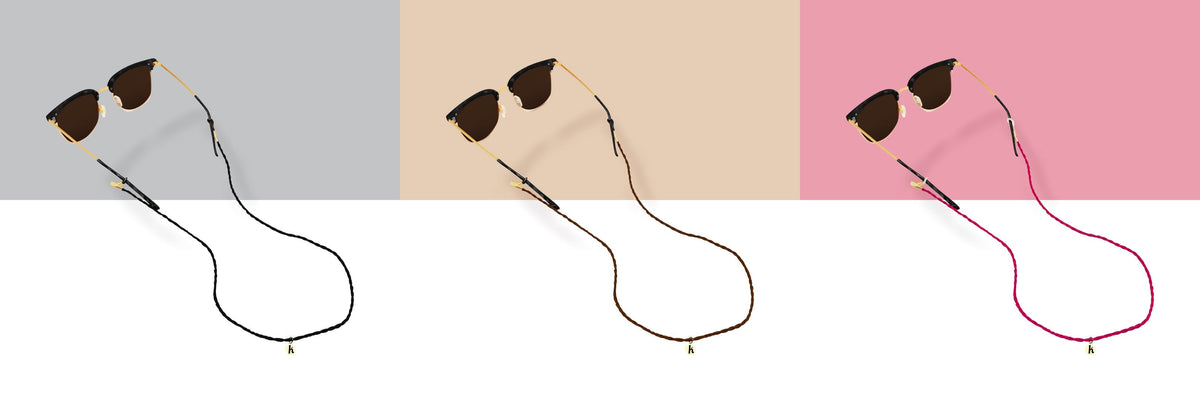 All three Keebos sunglass strap colors side by side: black, brown and pink, each on sunglasses with a gold Keebos pendant